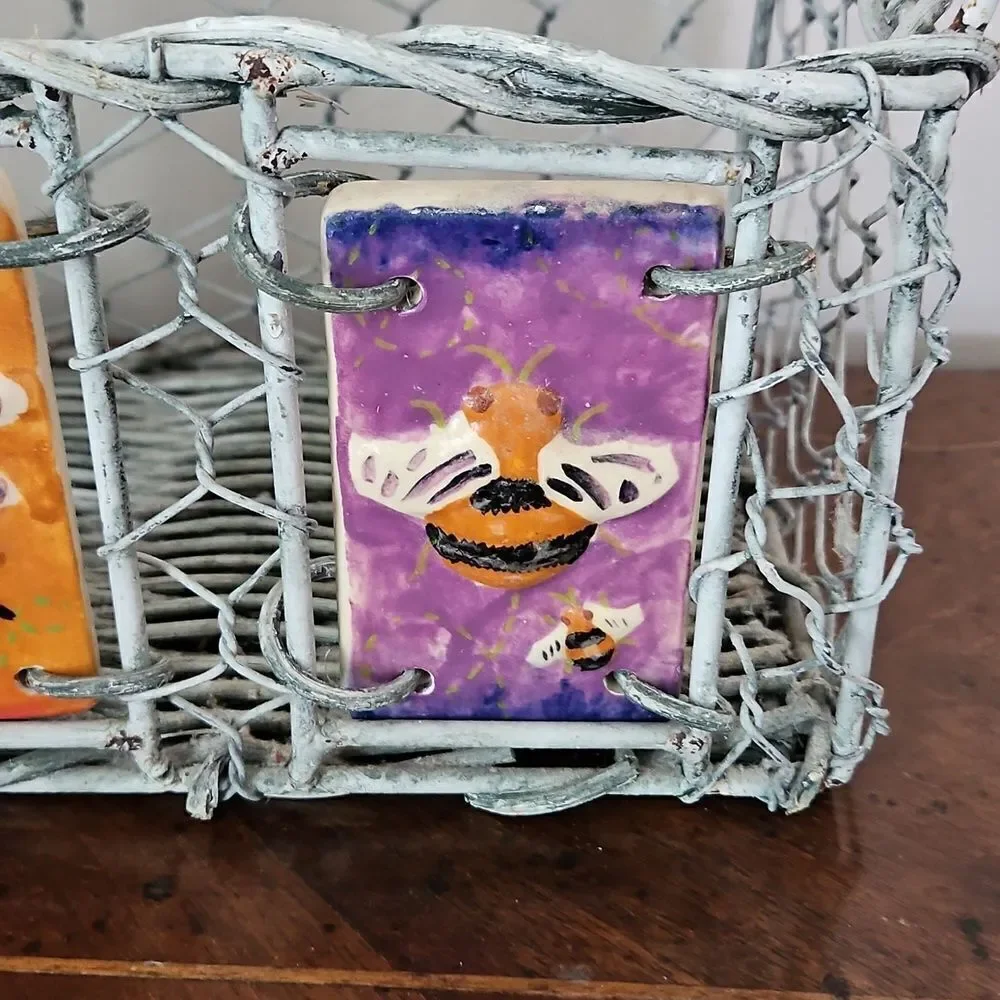 Vintage basket decorated with ceramic tiles